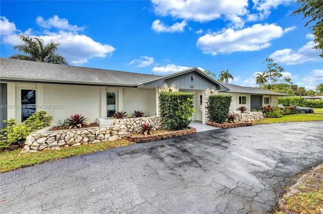 a view of a house with tub and porch