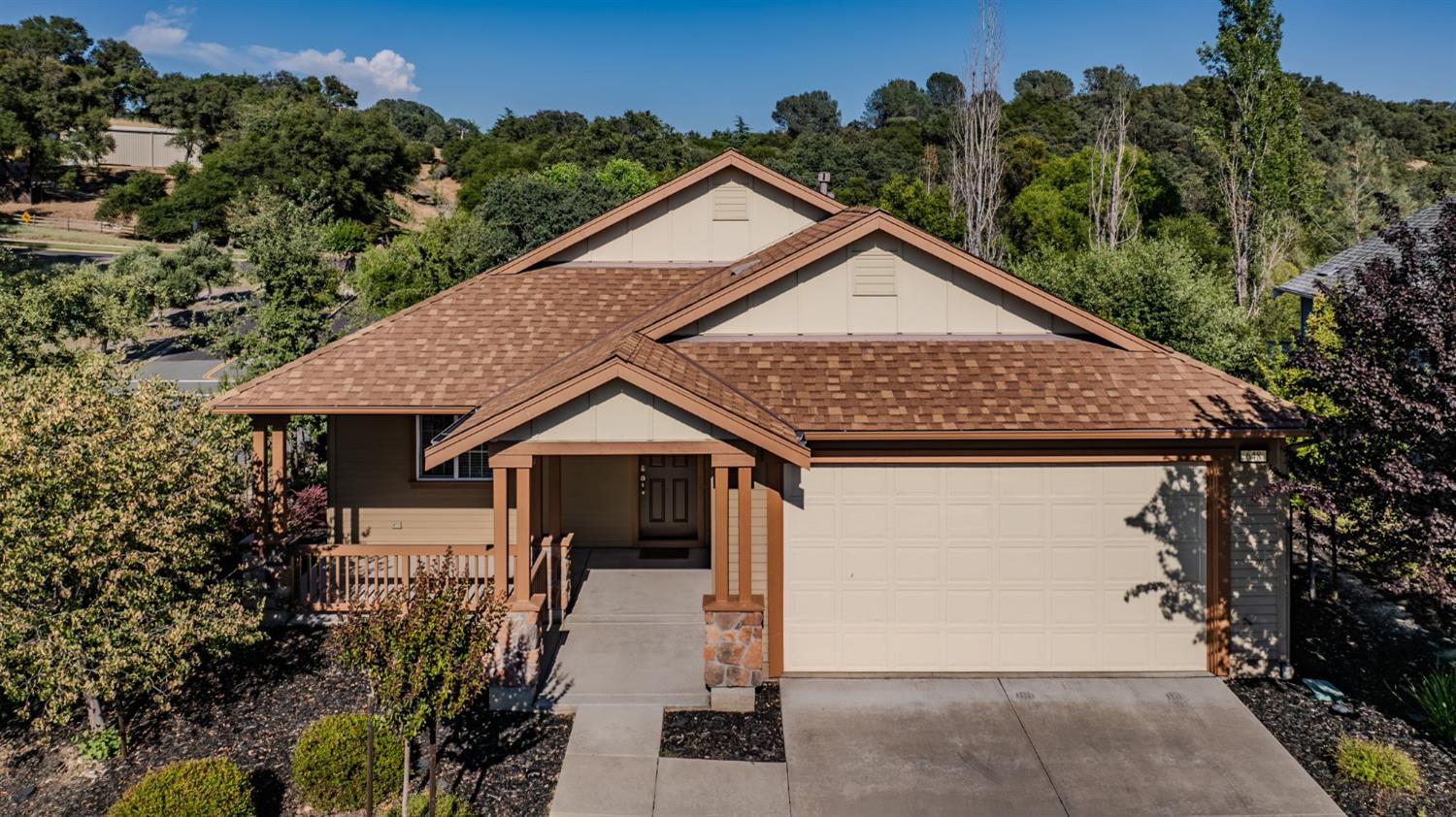 a house with trees in the background