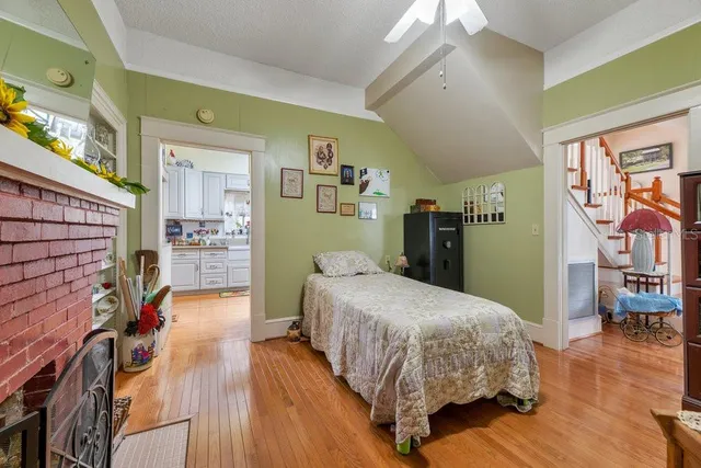 a bedroom with a bed and a walk in closet