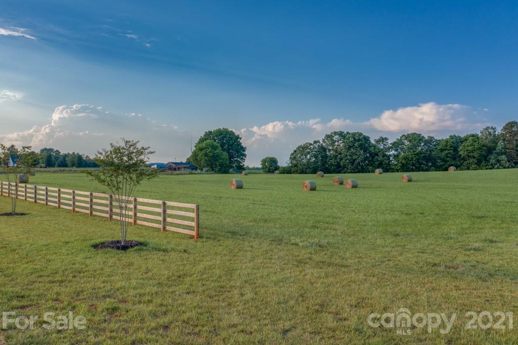 2380 New House Road Ellenboro, NC 28040 - Photo 11 of 44 a garden with wooden fence