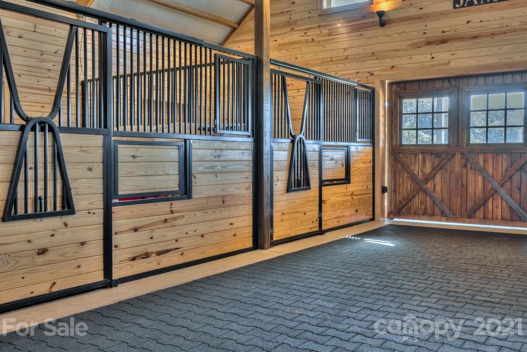 2380 New House Road Ellenboro, NC 28040 - Photo 22 of 44 a view of a hallway with wooden floor