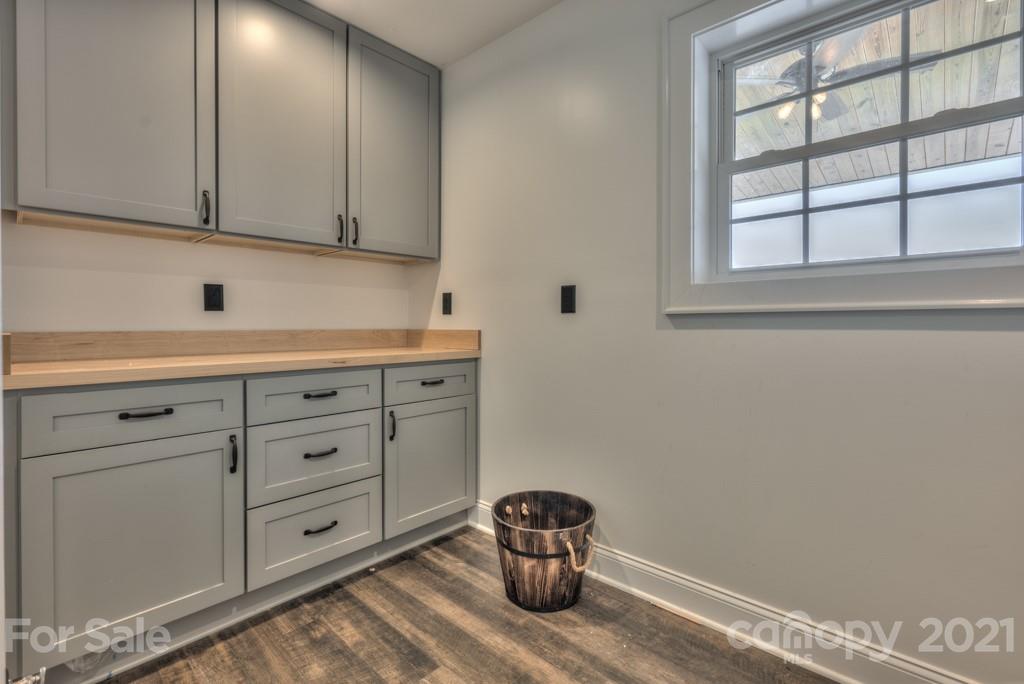 2380 New House Road Ellenboro, NC 28040 - Photo 26 of 44 a kitchen with cabinets and window