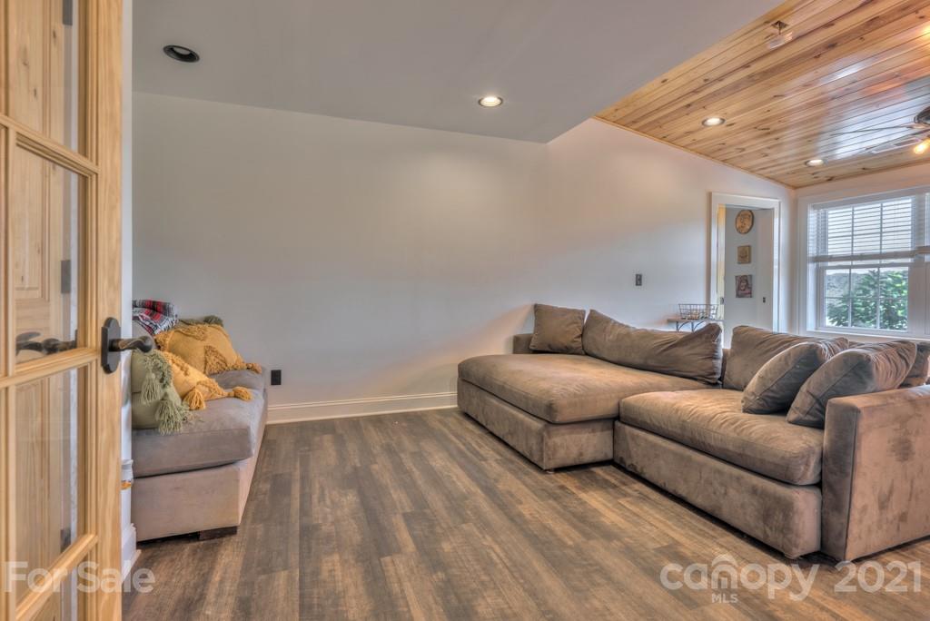 2380 New House Road Ellenboro, NC 28040 - Photo 36 of 44 a living room with furniture and a gate