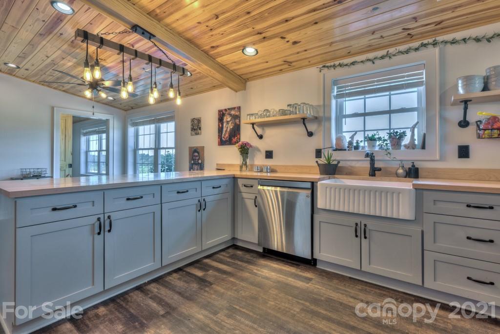 2380 New House Road Ellenboro, NC 28040 - Photo 42 of 44 a kitchen that has a lot of cabinets in it
