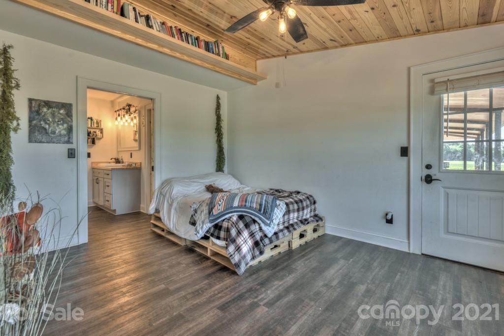 2380 New House Road Ellenboro, NC 28040 - Photo 43 of 44 a spacious bedroom with a bed and a window