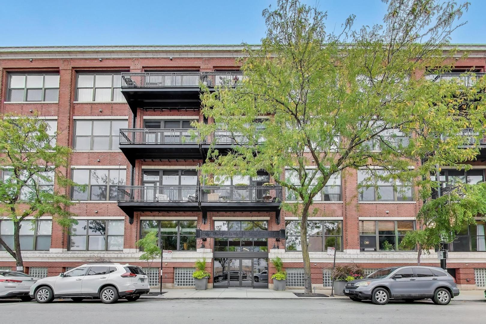a view of a cars parked in front of a building