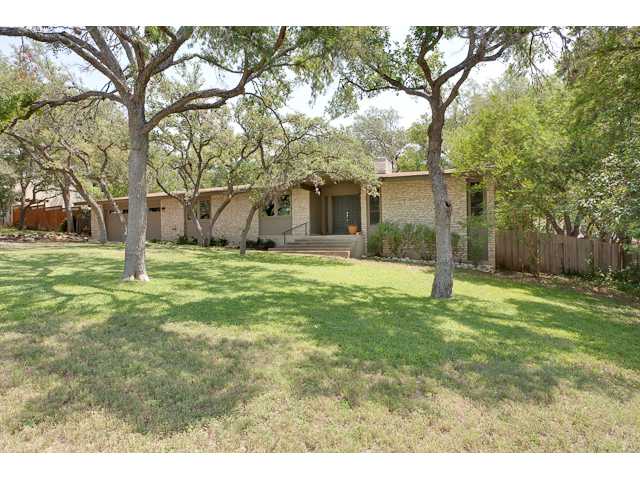 4709 Timberline Drive Austin, TX 78746 - Photo 1 of 1 a view of a house with a yard