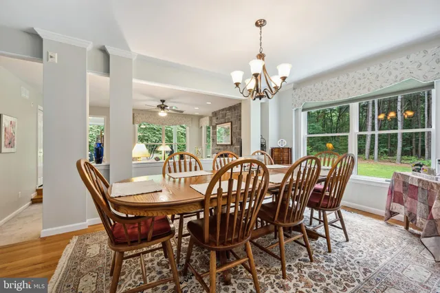 a bedroom with a bed and a tv