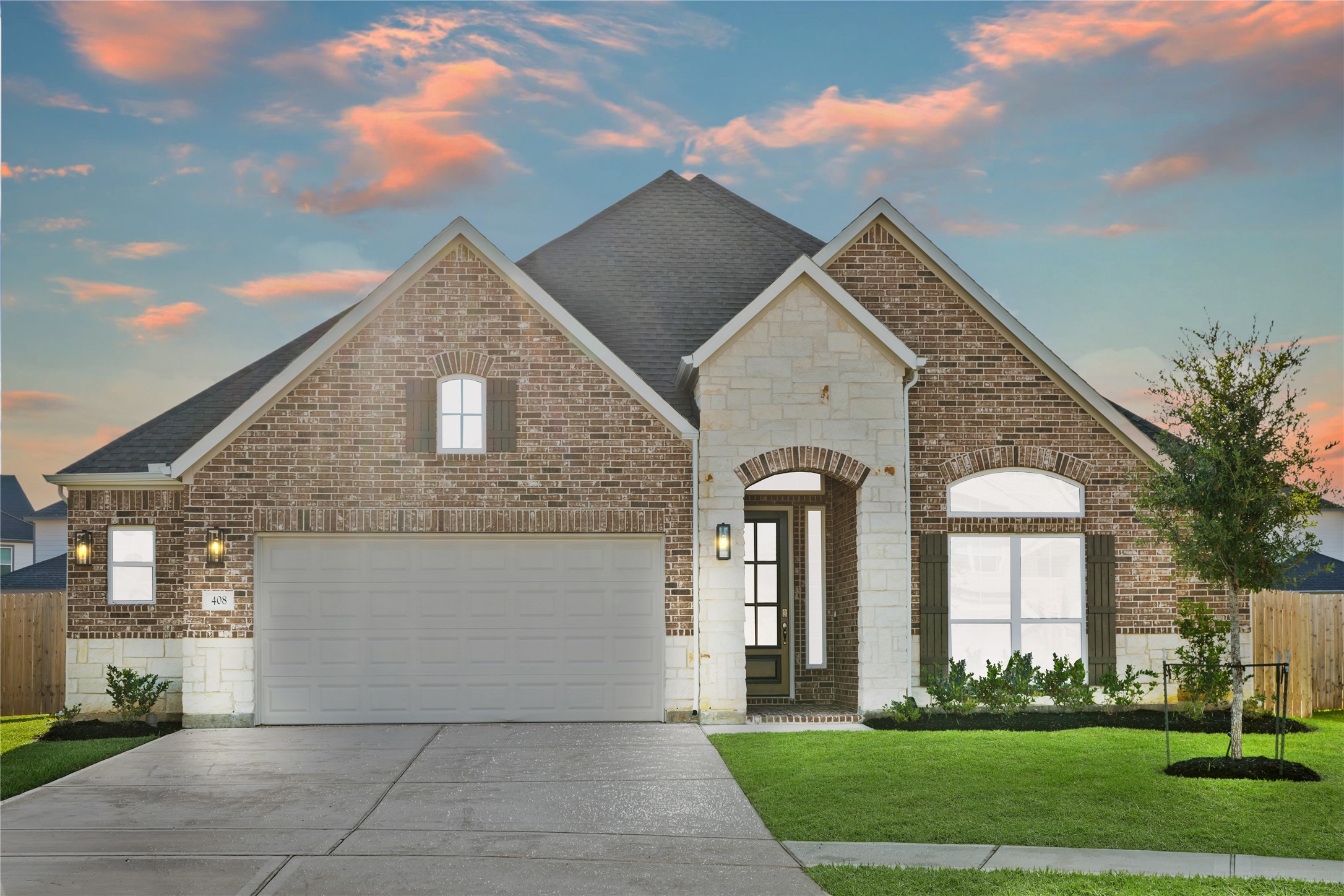 408 Inner Cove Lane Waller, TX 77484 - Photo 2 of 48 a front view of a house with a yard