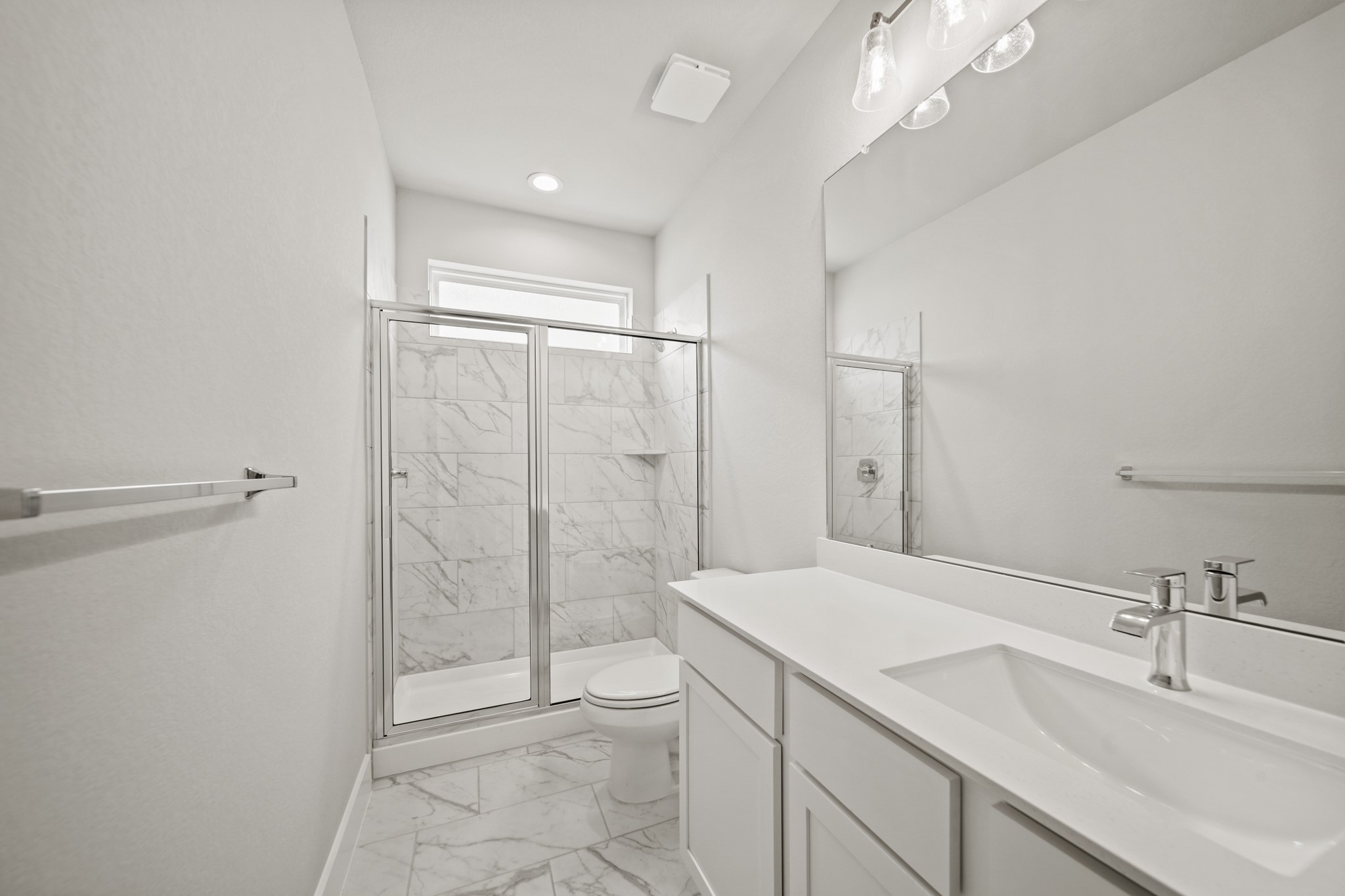 408 Inner Cove Lane Waller, TX 77484 - Photo 28 of 48 a bathroom with a shower sink and mirror