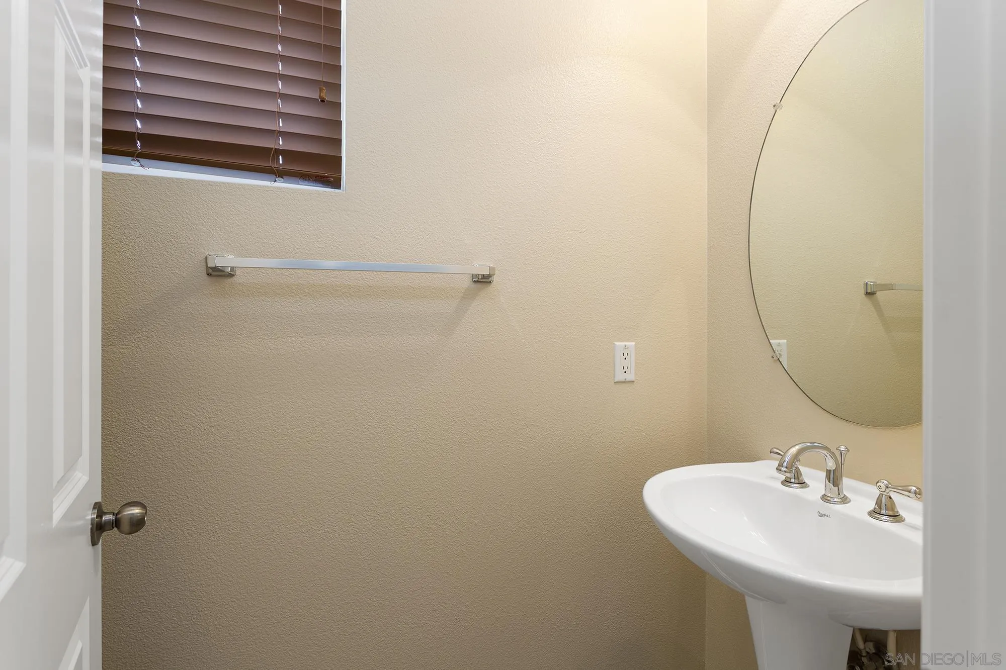 41865 Davenport Way, Unit A Murrieta, CA 92562 - Photo 11 of 26 a bathroom with a sink a vanity and a mirror