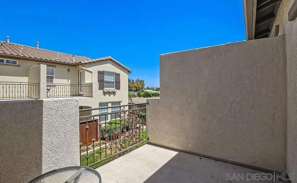 41865 Davenport Way, Unit A Murrieta, CA 92562 - Photo 14 of 26 a backyard of a house with seating space