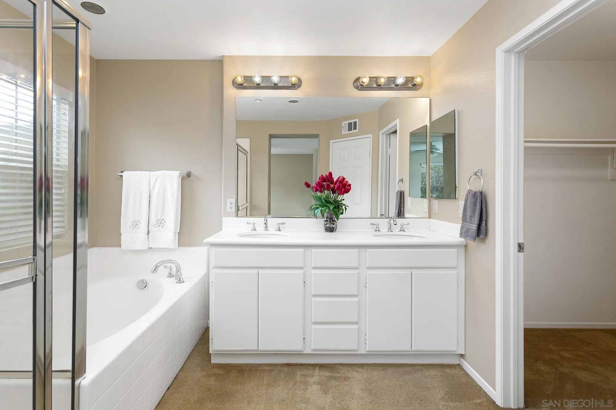41865 Davenport Way, Unit A Murrieta, CA 92562 - Photo 16 of 26 a bathroom with a bathtub sink and mirror