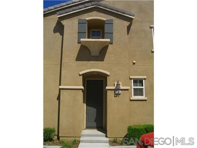 41865 Davenport Way, Unit A Murrieta, CA 92562 - Photo 2 of 26 a front view of a house with a yard