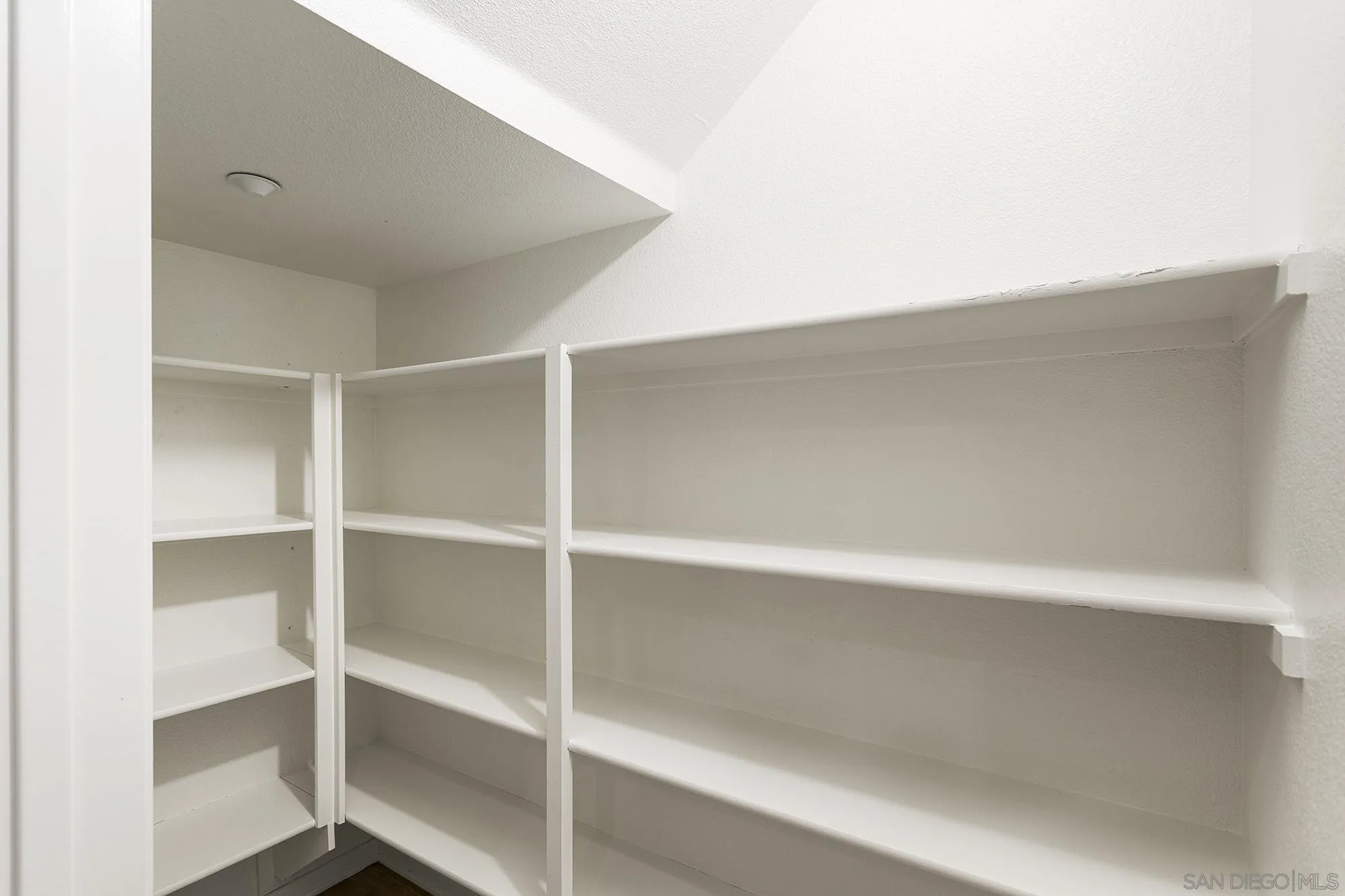 41865 Davenport Way, Unit A Murrieta, CA 92562 - Photo 8 of 26 a view of an empty walk in closet