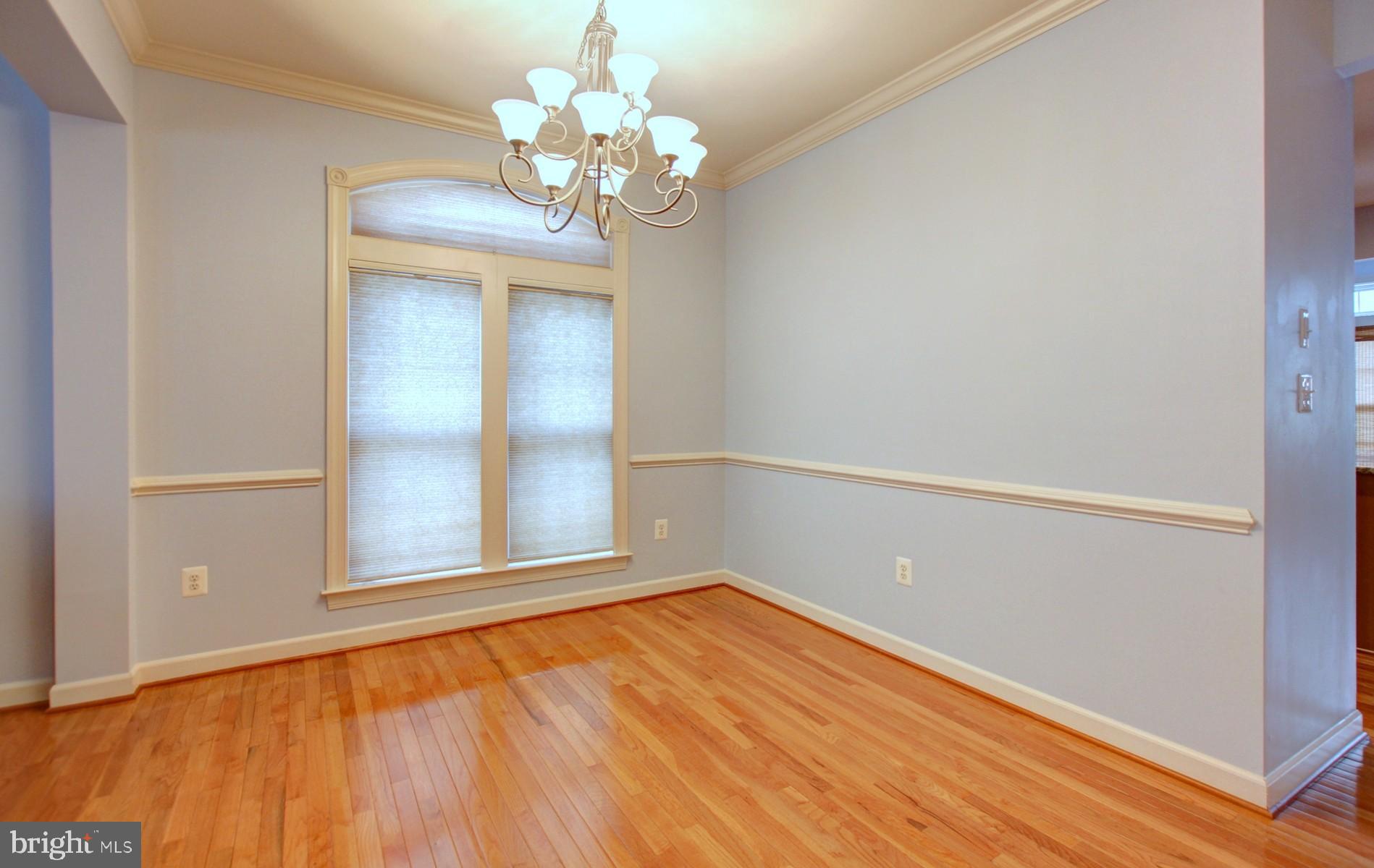 1552 Rutland Way Hanover, MD 21076 - Photo 8 of 28 Dining Room with chair rail.