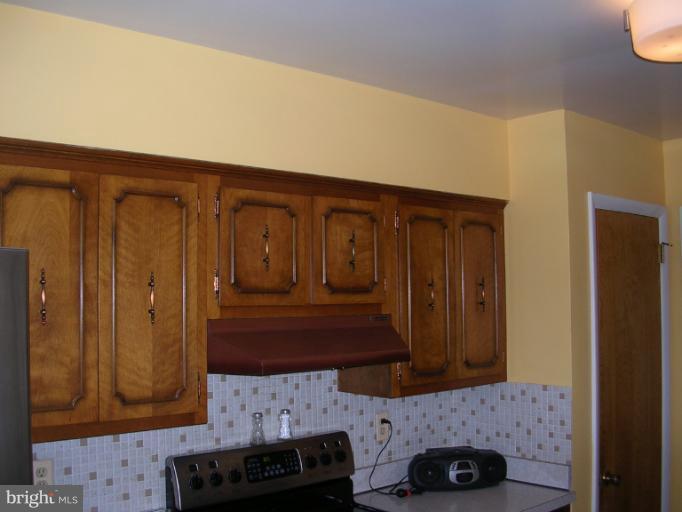 8703 Windsor Mill Road Windsor Mill, MD 21244 - Photo 2 of 30 Kitchen cabinets and pantry