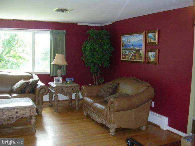 8703 Windsor Mill Road Windsor Mill, MD 21244 - Photo 20 of 30 Living Room is nice hardwood floors