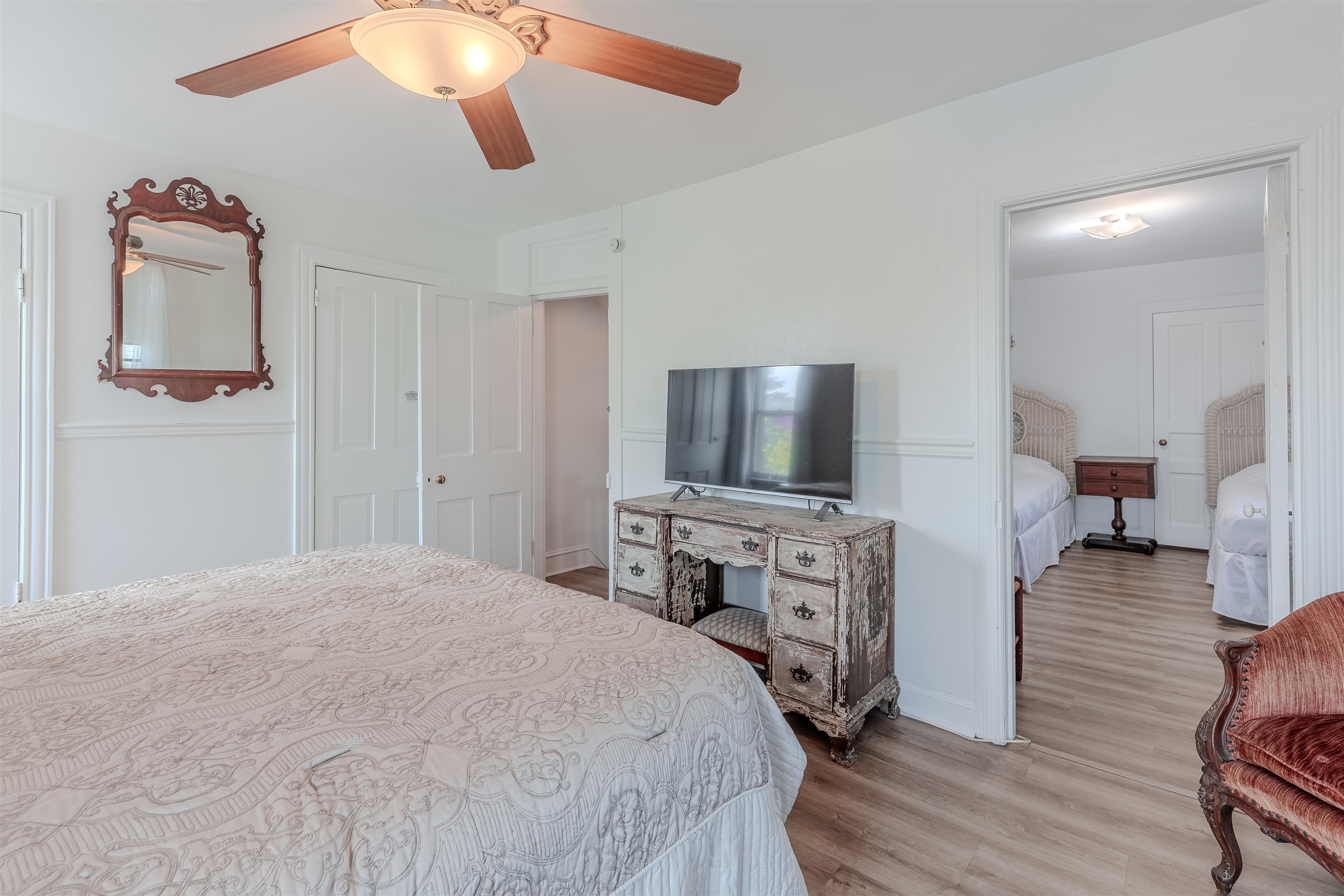 127 3rd West Cape May, NJ 08204 - Photo 20 of 38 a bedroom with furniture and a flat screen tv