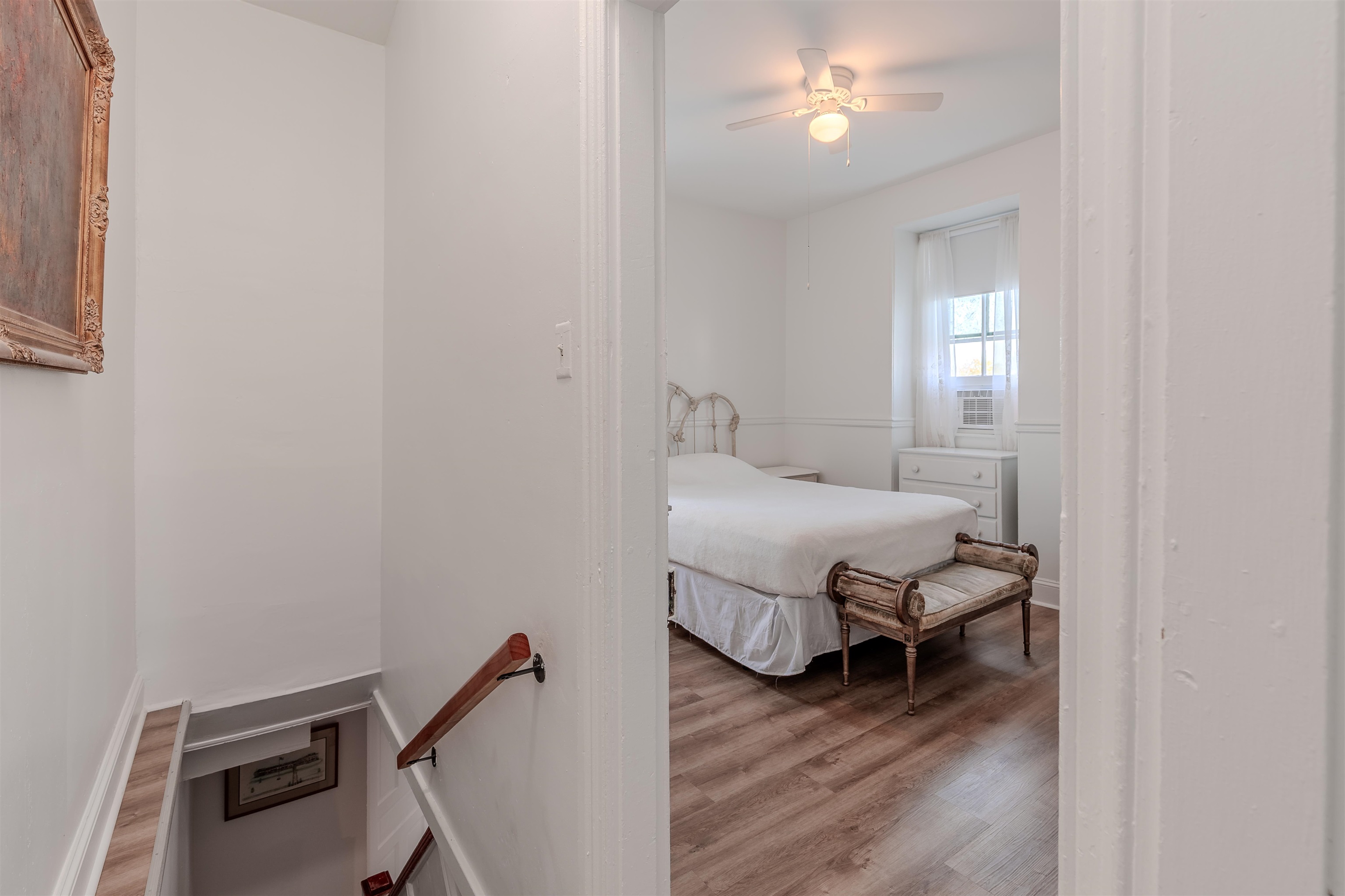 127 3rd West Cape May, NJ 08204 - Photo 33 of 38 a bedroom with a bed window and a night stand