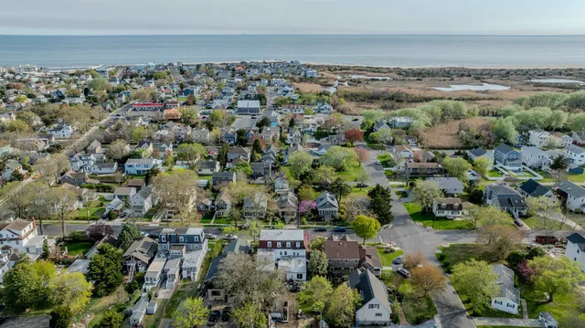 an aerial view of a city with lots of residential buildings
