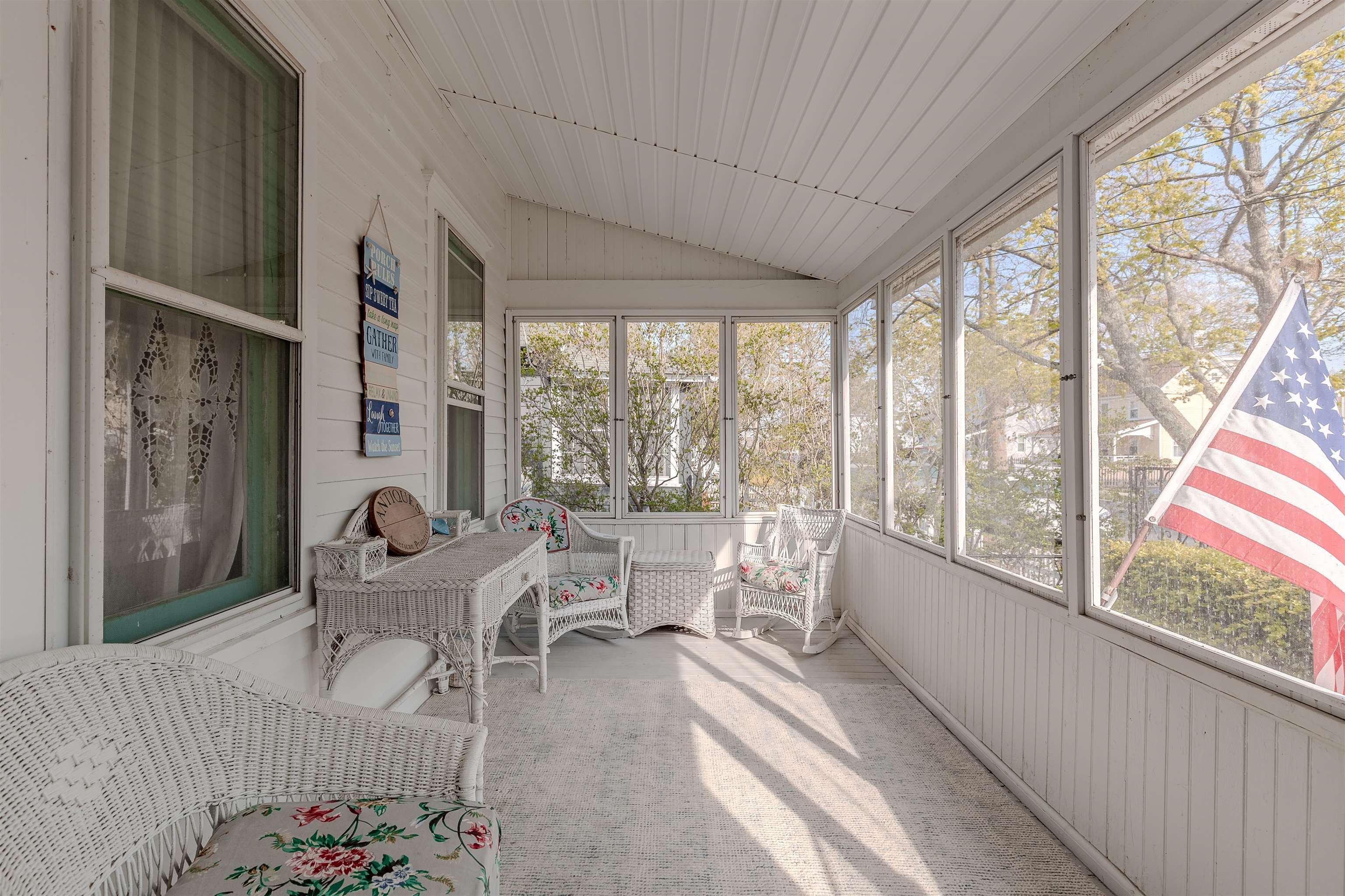 127 3rd West Cape May, NJ 08204 - Photo 5 of 38 a living room with furniture and a large window