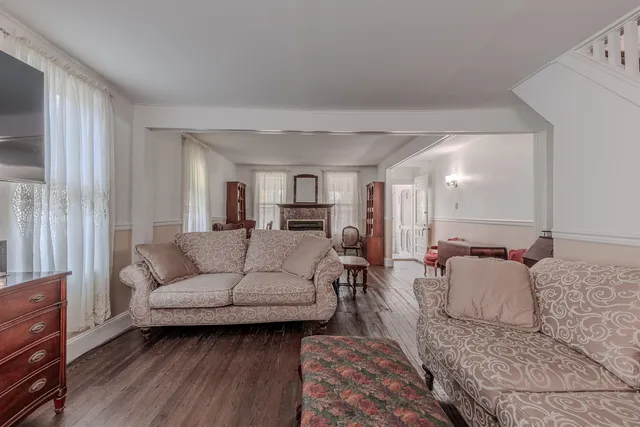 a living room with furniture and a couch