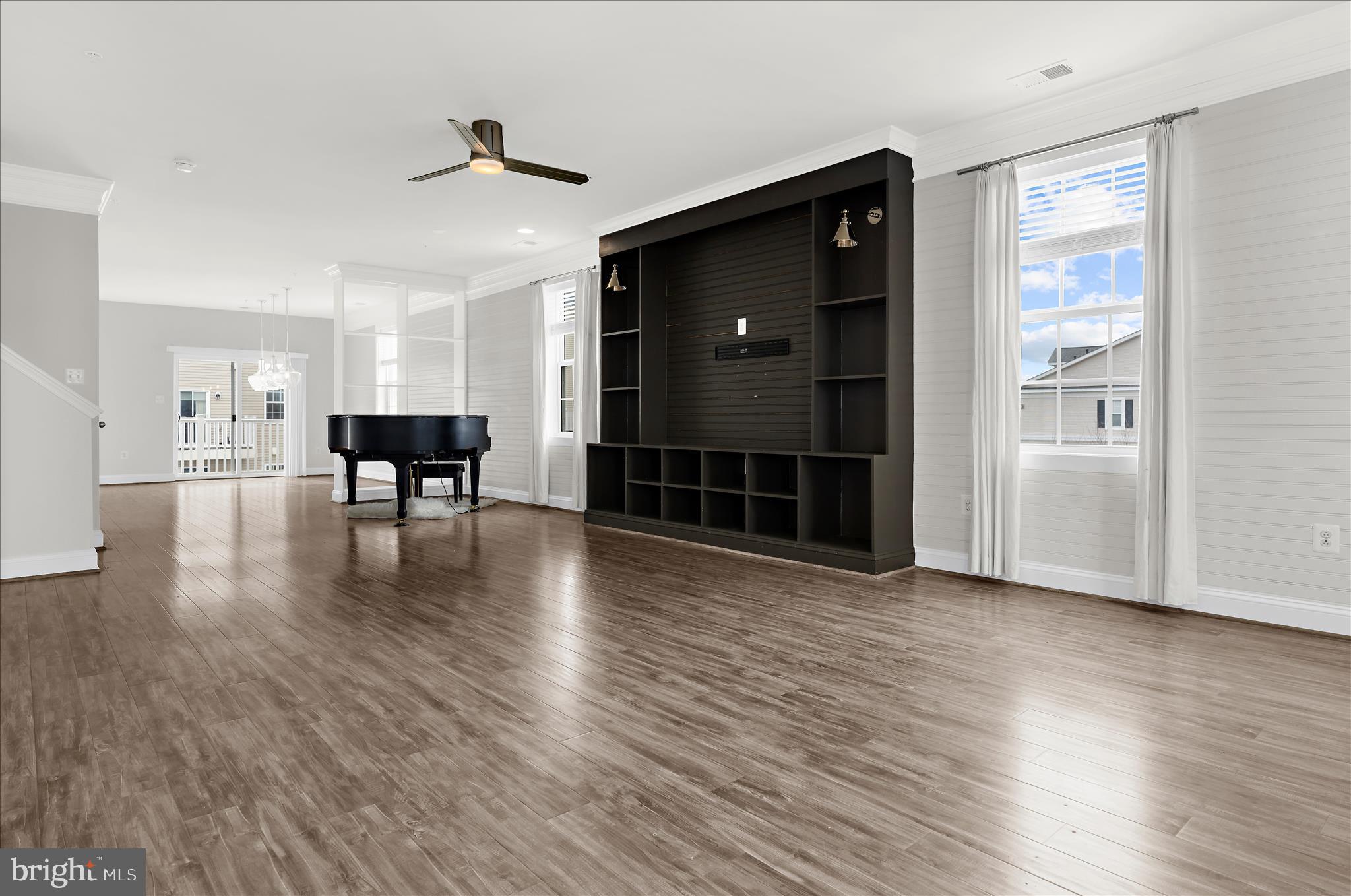 1704 Fieldstone Court Hanover, MD 21076 - Photo 11 of 47 a view of empty room with wooden floor and a window