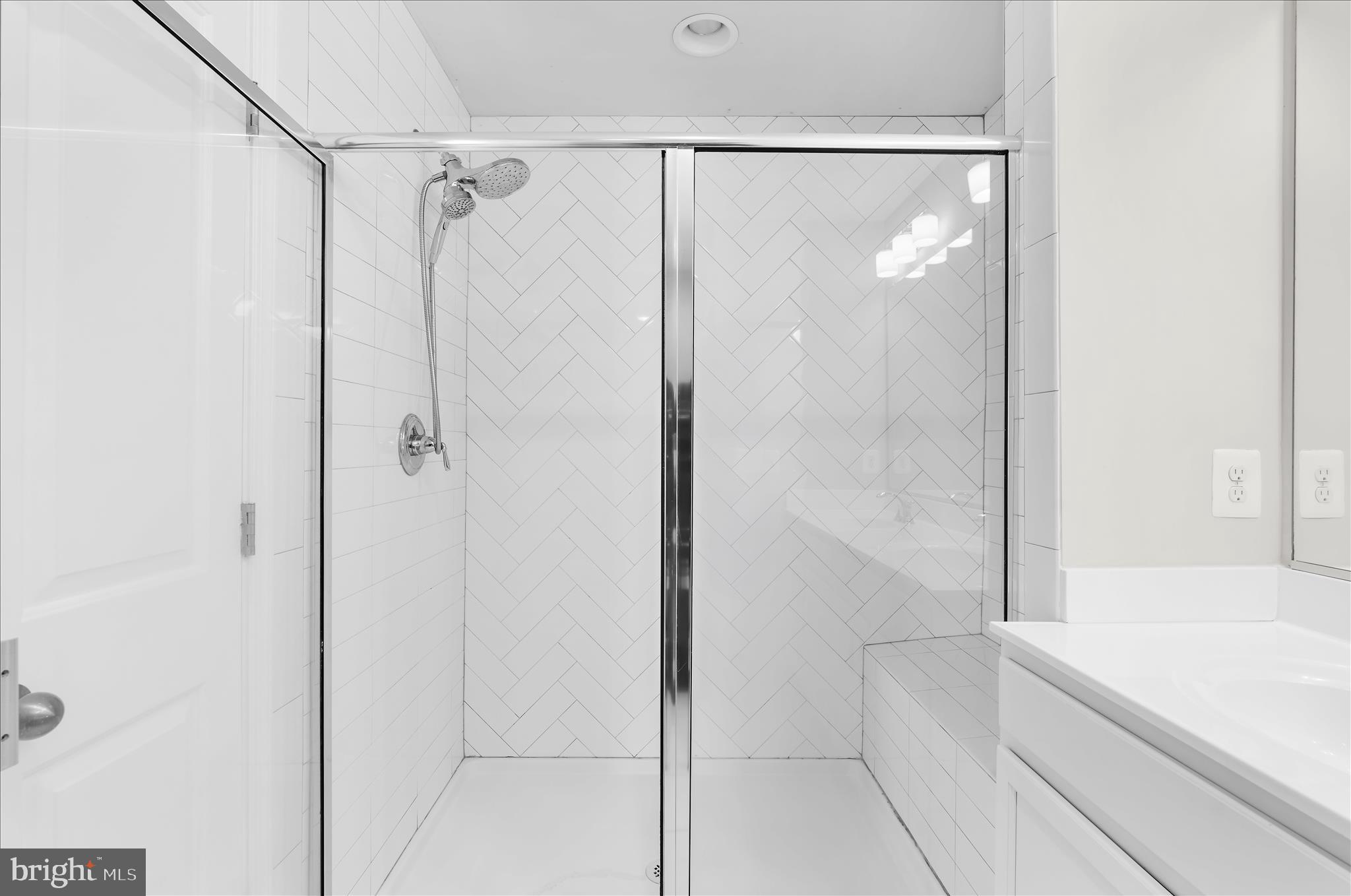 1704 Fieldstone Court Hanover, MD 21076 - Photo 28 of 47 a bathroom with a bathtub and a shower