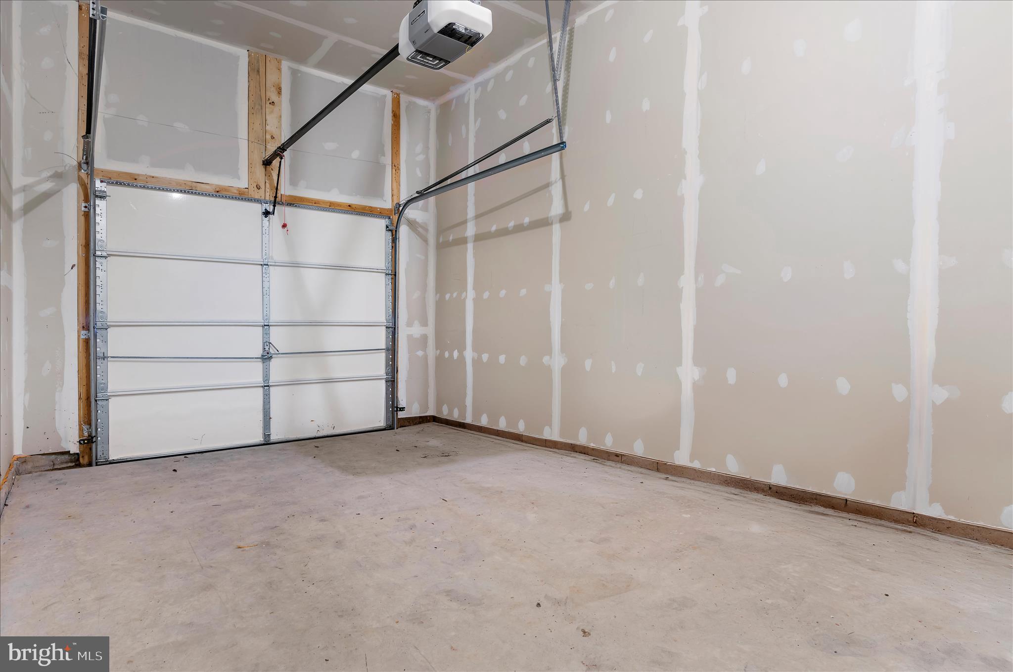 1704 Fieldstone Court Hanover, MD 21076 - Photo 36 of 47 an empty room with a ceiling fan