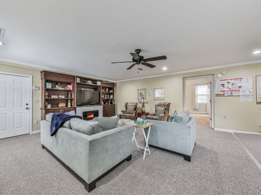 3605 Shallowford Road Marietta, GA 30062 - Photo 19 of 42 a living room with furniture and a large window