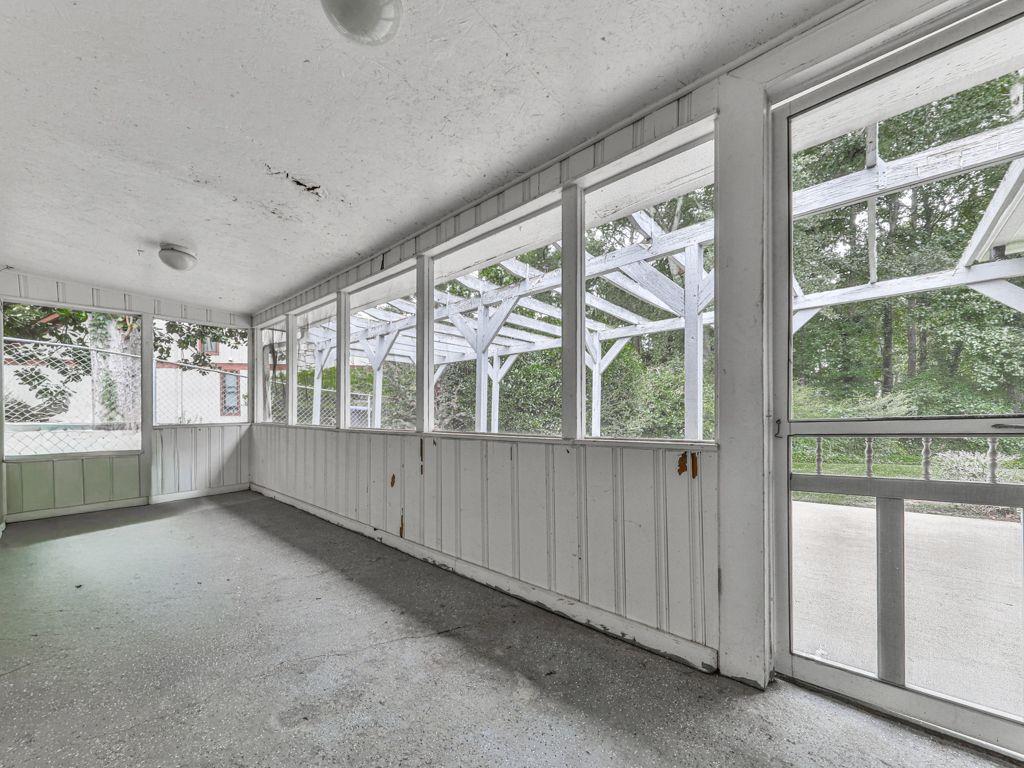 3605 Shallowford Road Marietta, GA 30062 - Photo 29 of 42 an empty room with windows