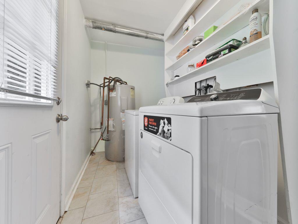 3605 Shallowford Road Marietta, GA 30062 - Photo 30 of 42 a utility room with dryer and washer