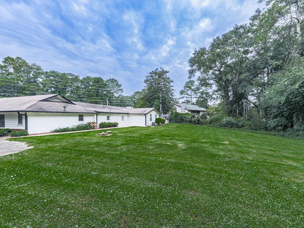 3605 Shallowford Road Marietta, GA 30062 - Photo 33 of 42 a view of house with a big yard