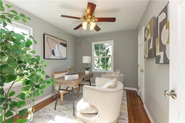 a bathroom with a sink toilet and mirror