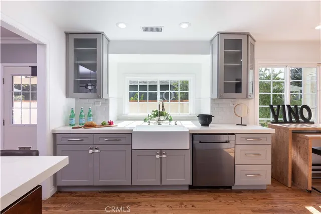 a bathroom with a toilet a sink and a mirror