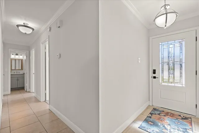 a view of a room with wooden floor cabinet and windows