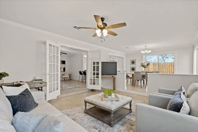 a kitchen with a table and chairs in it