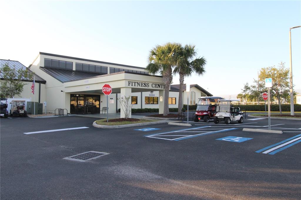 1005 Rickenbacker Drive Sun City Center, FL 33573 - Photo 51 of 57 a view of street with cars