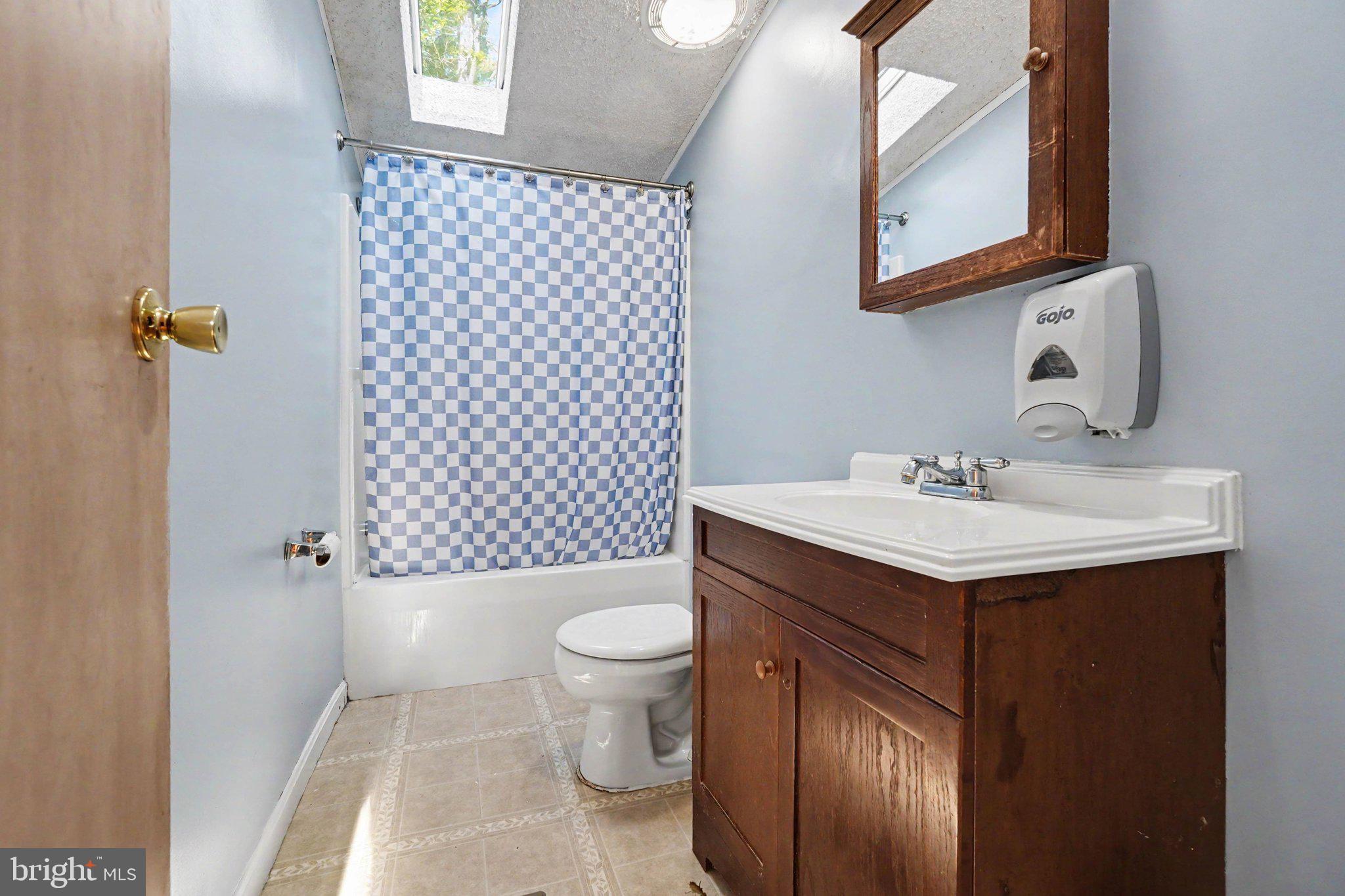 46 Pisgah Rest Shermans Dale, PA 17090 - Photo 22 of 36 a bathroom with a sink toilet and shower