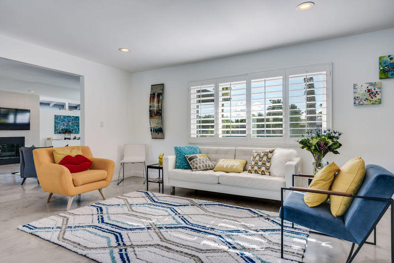 426 East Simms Road Palm Springs, CA 92262 - Photo 14 of 58 a living room with furniture a rug and a large window