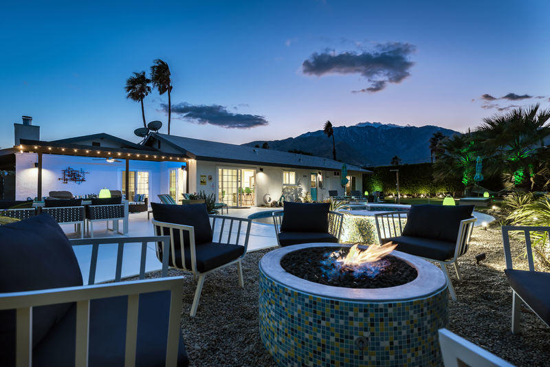 426 East Simms Road Palm Springs, CA 92262 - Photo 50 of 58 a view of a house with backyard water fountain and sitting area