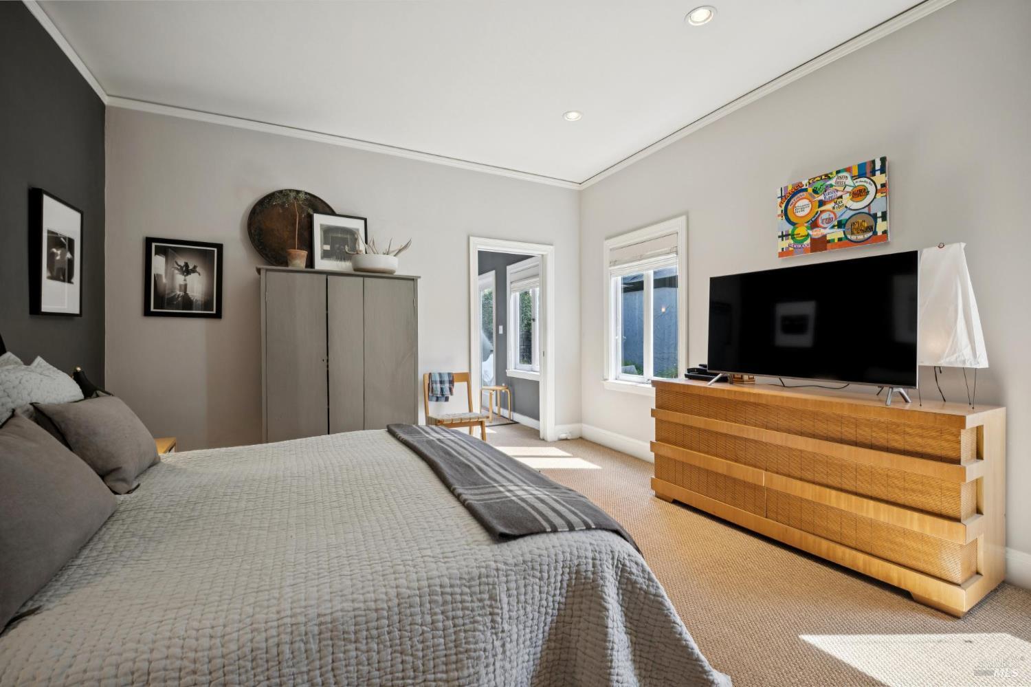 22 Clyde Avenue San Rafael, CA 94901 - Photo 23 of 66 a bedroom with a bed and a flat screen tv