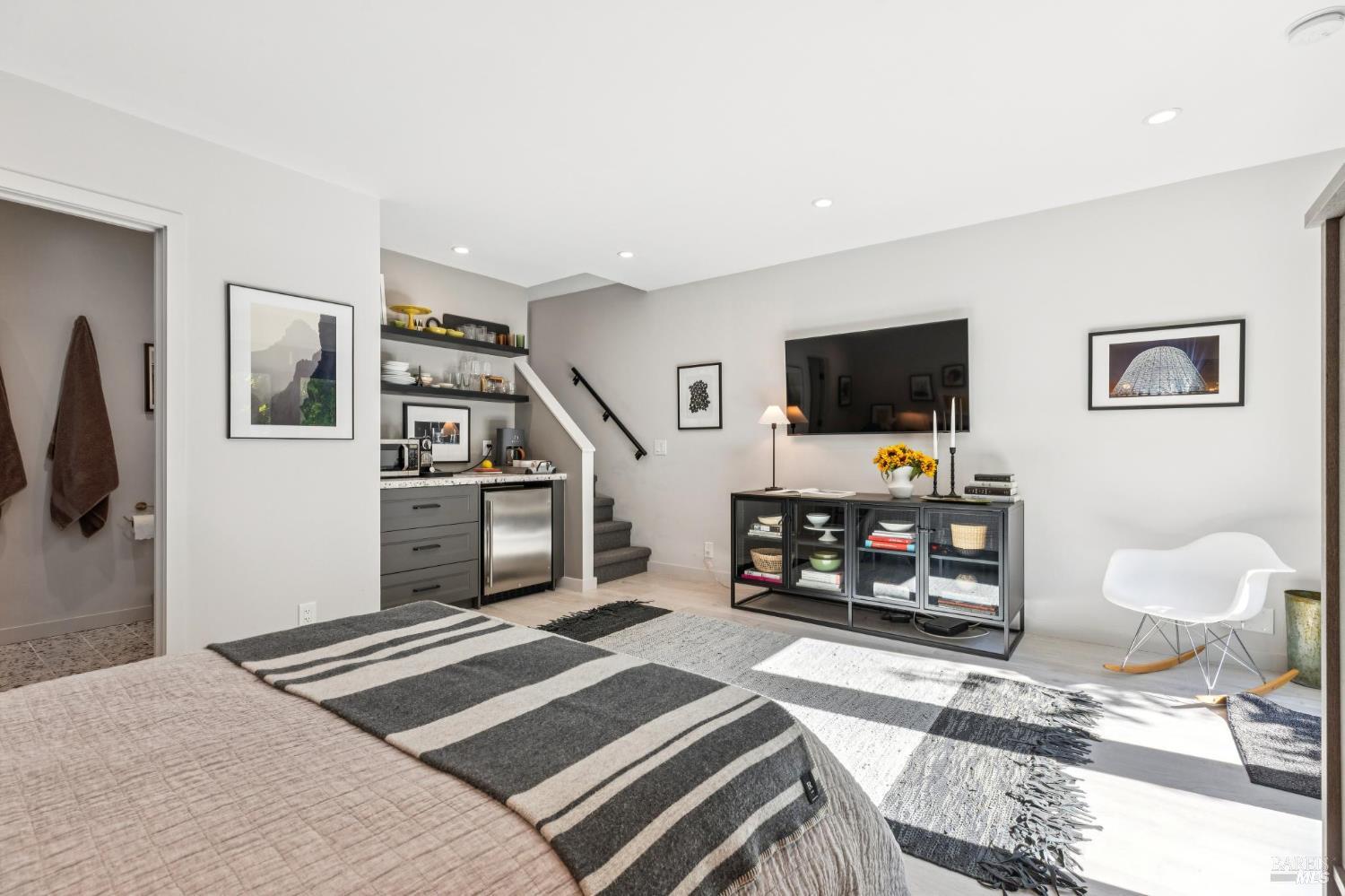 22 Clyde Avenue San Rafael, CA 94901 - Photo 40 of 66 a bedroom with furniture and a flat screen tv