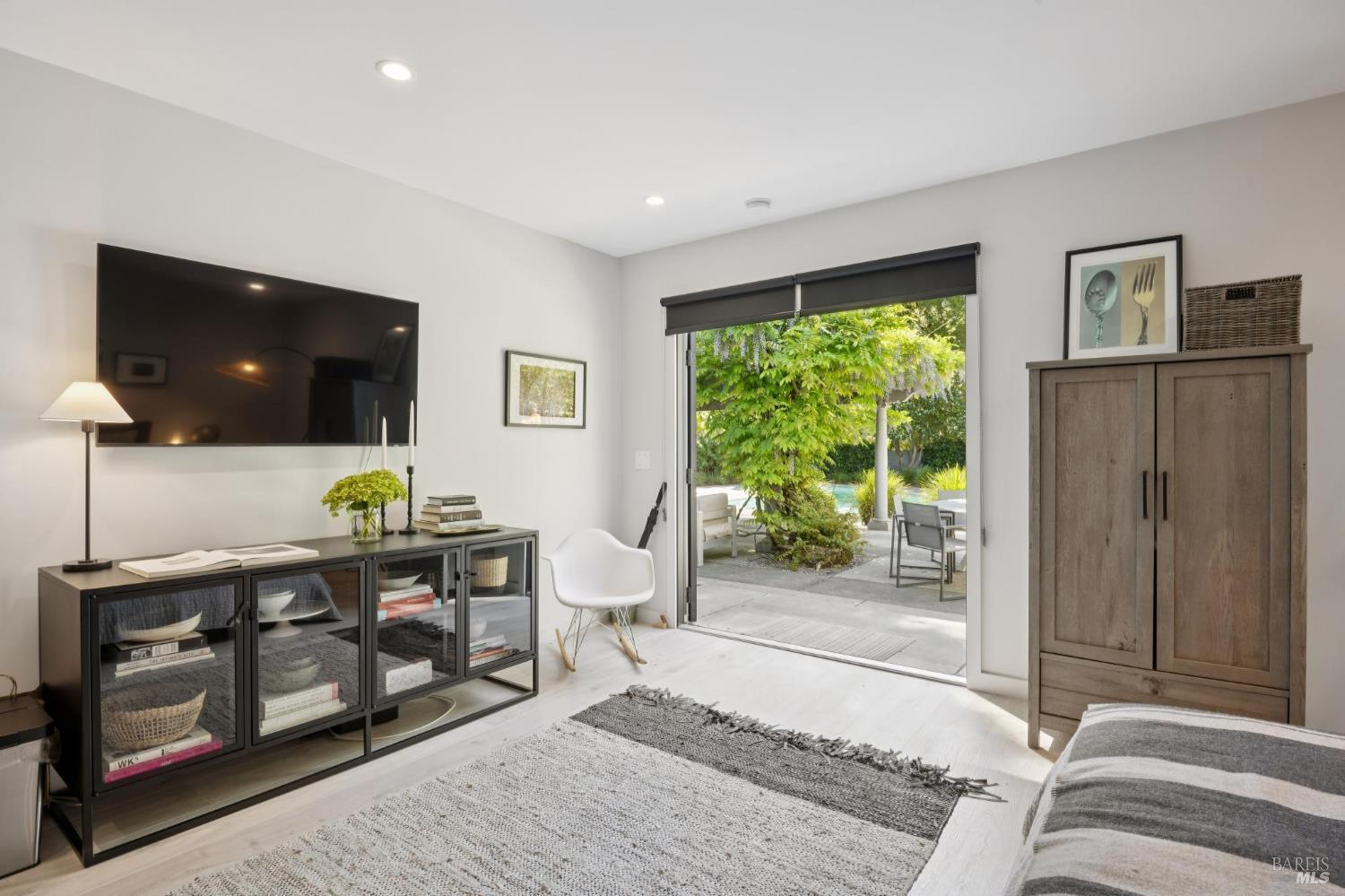 22 Clyde Avenue San Rafael, CA 94901 - Photo 41 of 66 a living room with furniture and a flat screen tv