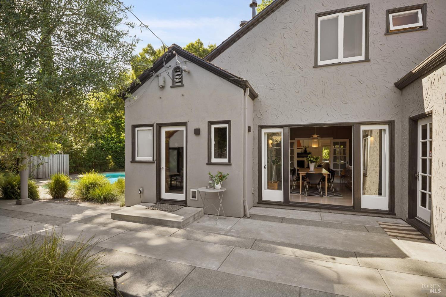 22 Clyde Avenue San Rafael, CA 94901 - Photo 49 of 66 a view of a house with large windows and plants