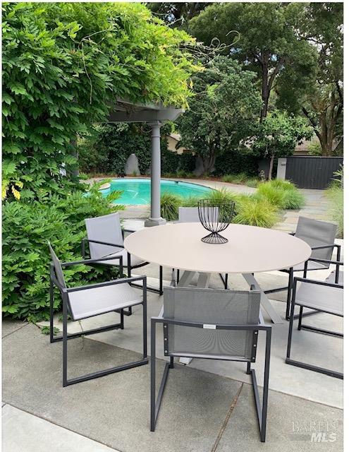 22 Clyde Avenue San Rafael, CA 94901 - Photo 54 of 66 a view of a patio with a table and chairs
