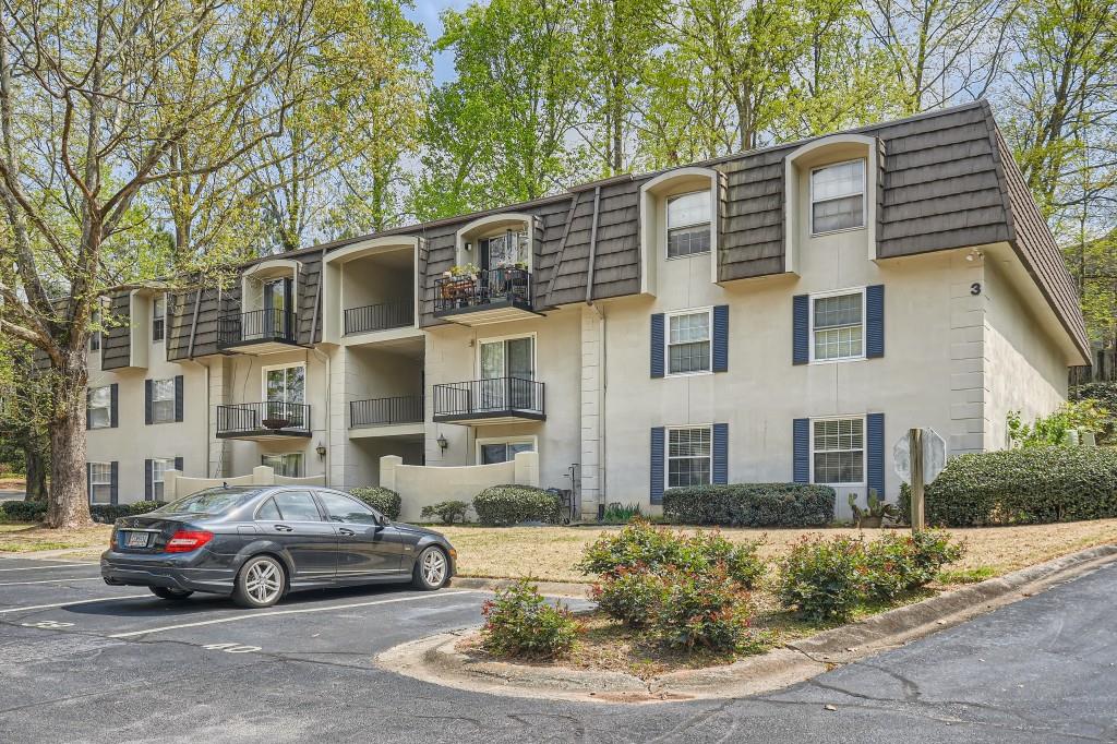a car parked in front of a house
