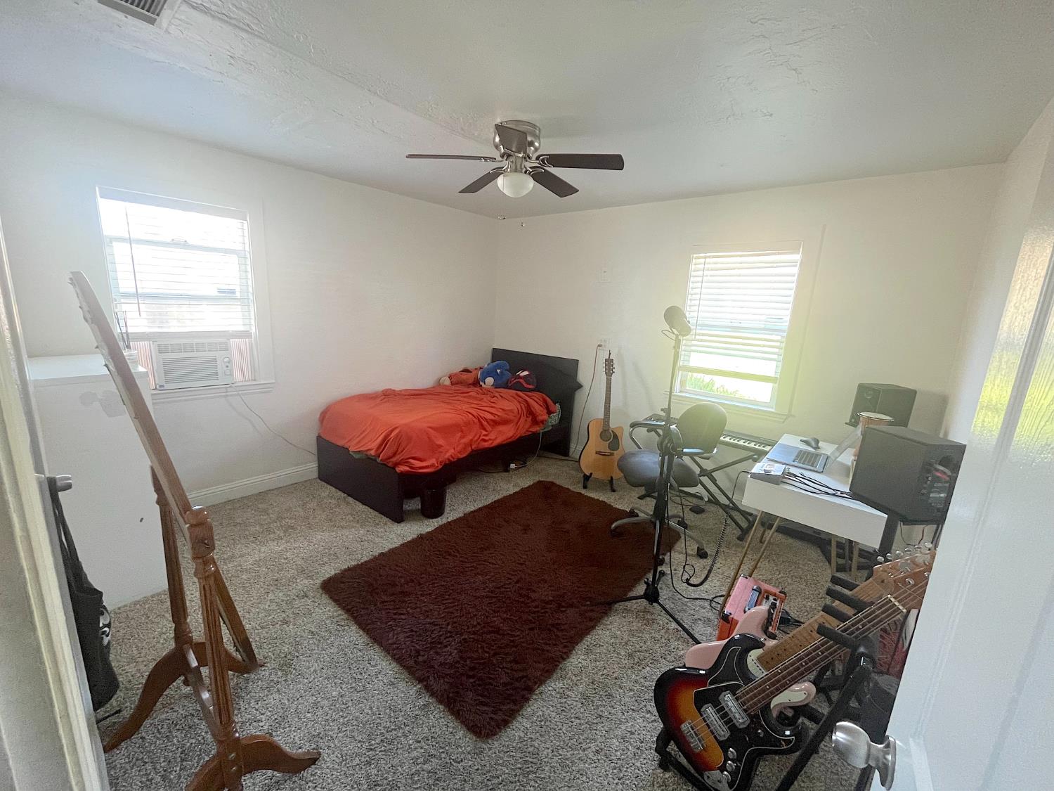 5121 Kenneth Avenue Carmichael, CA 95608 - Photo 12 of 38 a bedroom with furniture and a window