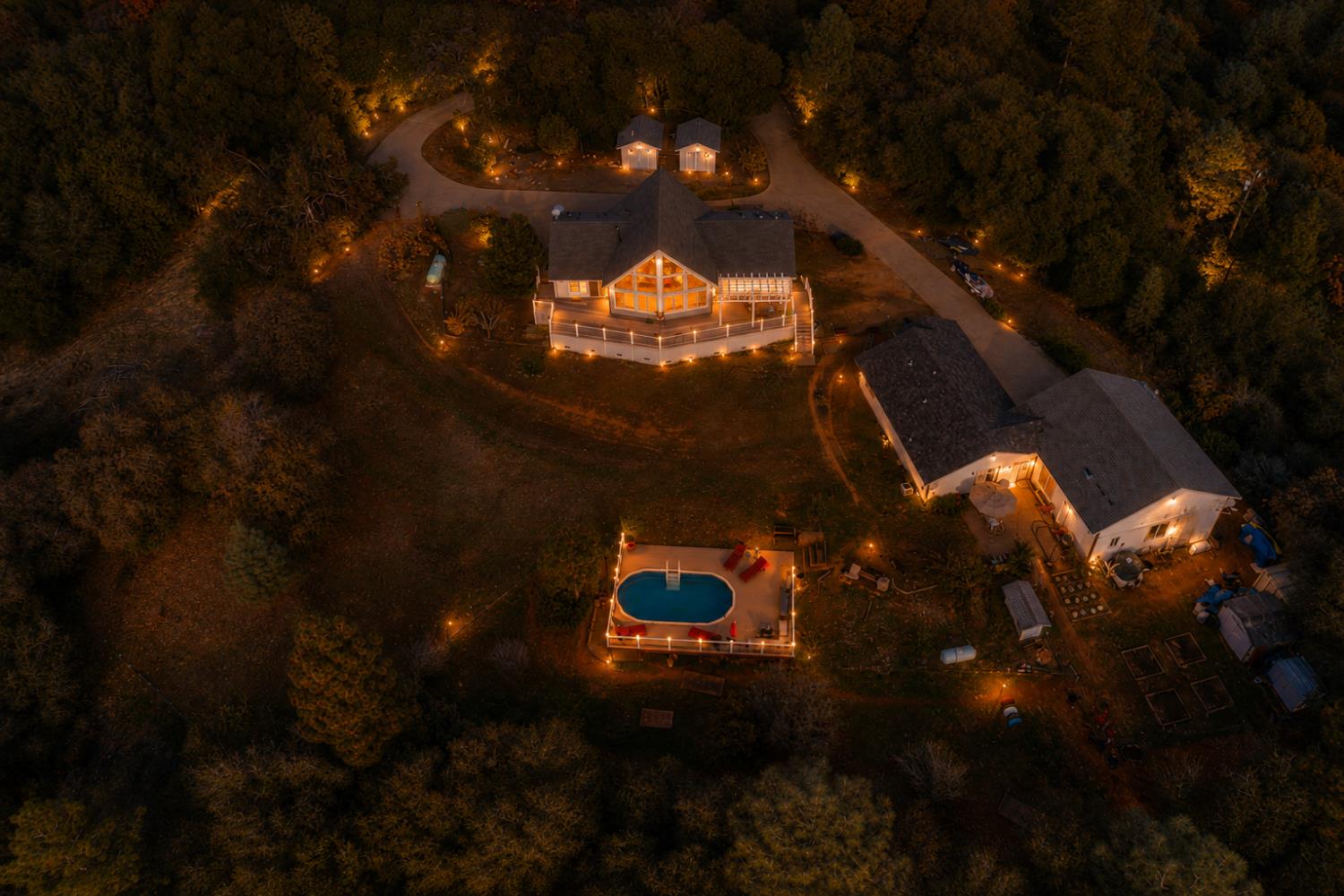 83 Northfork Road Berry Creek, CA 95916 - Photo 50 of 56 a night view of swimming pool